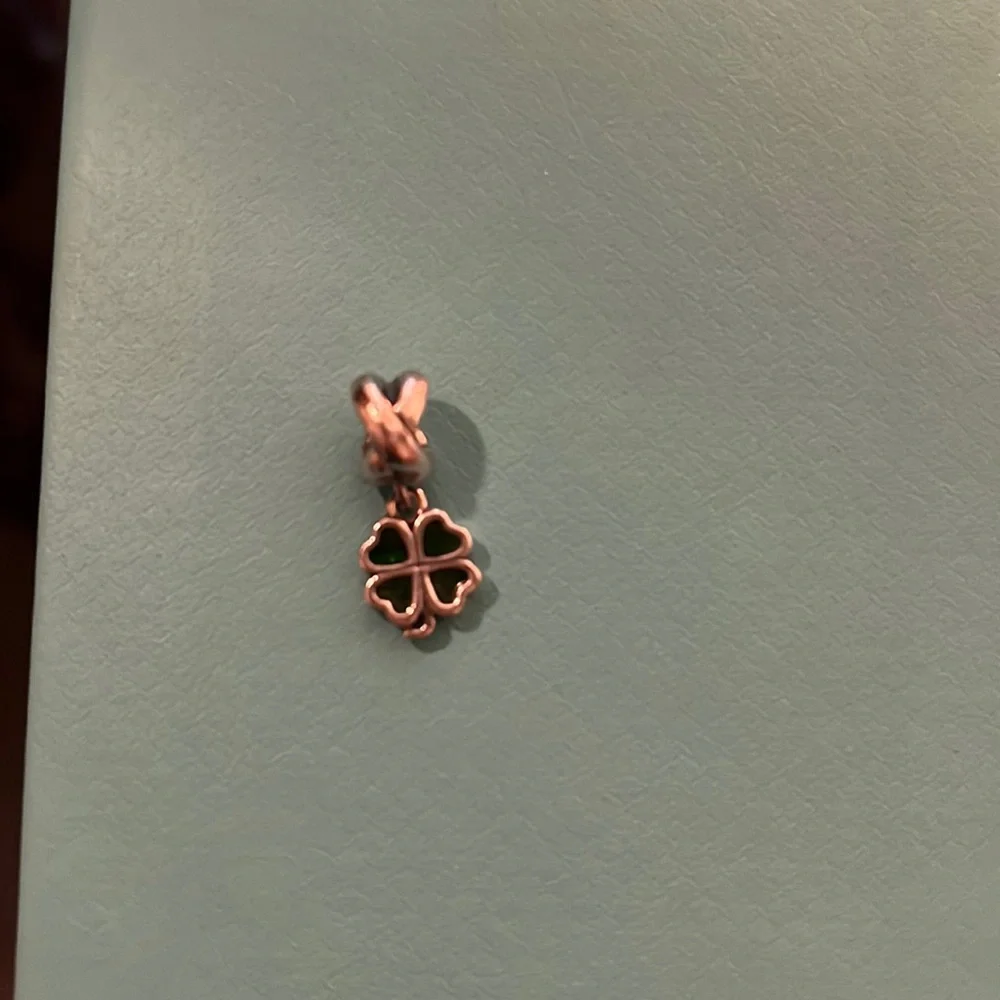 Pandora silver circle crossing charm with dangling 4 leaf clover
